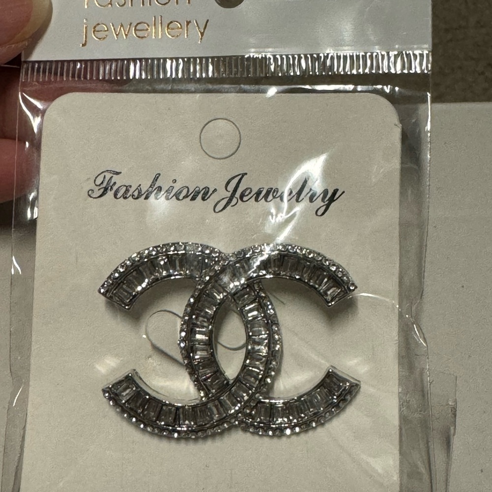CC brooches